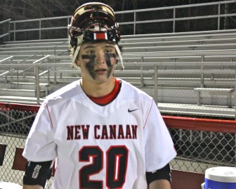 New Canaan's Kyle Smith on the sidelines as the Rams defeated Wilton 14-3 on Thursday, April 23, 2015. Credit: Terry Dinan