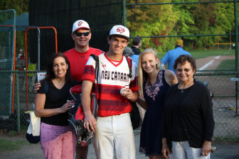 The Jones family poses with the game-winning home run ball. Credit: Terry Dinan 