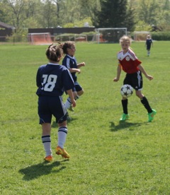 Lexie Tully controls the ball during the NC Girls U9 Red win this Sunday against Westport White.