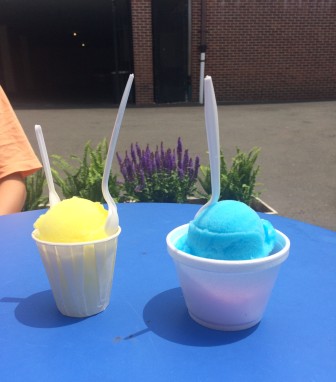 A kid's scoop of Pina Colada (left) and a small (two scoops) of Blue Raspberry and Watermelon Italian Ice. Photo by Mackenzie Lewis