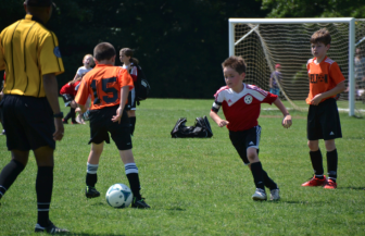 Matthew Stimpson charges the ball. Contributed