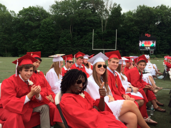 Waiting to graduate, at New Canaan High School graduation on June 18, 2015. Credit: Michael Dinan
