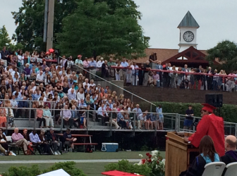 NCHS senior Shaan Appel addresses the crowd during "Moments of Reflection" at New Canaan High School graduation on June 18, 2015. Credit: Michael Dinan