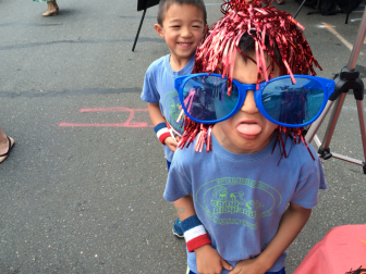 Gavin Tong pulled a great goofy face during the 2015 Sidewalk Sale in New Canaan, July 18. Credit: Michael Dinan