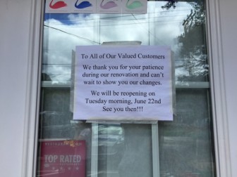 This sign appeared on Silvermine Market last month. It has been removed though the neighborhood market and restaurant isn't open yet. Credit: Sophia Welch