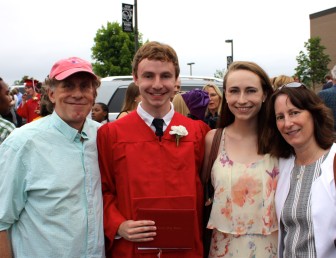 L-R: Cam Hutchins with his son Alex, daughter Emma and wife Julia at New Canaan High School graduation in June 2015. Contributed