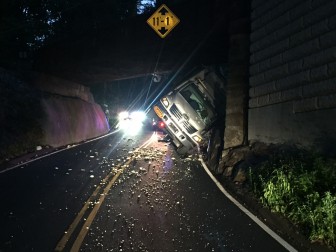 A truck stuck under the Route 106 overpass on Aug. 31, 2015. Credit: Terry Dinan