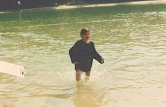 Carrie Pennoyer circa age 10 participating in the "swim in a sweatshirt" race at Camp Y-Ki, 1985ish. Photo contributed by Maggie Pennoyer