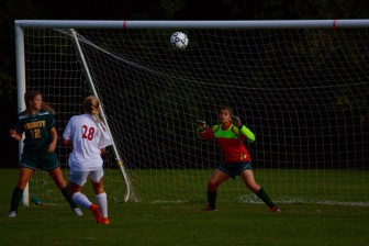 Freshman Brooke Volpe connecting on a goal to cap off the four-goal first half. Credit: Amy Murphy Carroll
