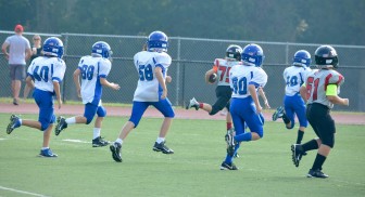 Andrew Rittenberry with a 56-yard INT return for a TD. Credit: Diane Rasso