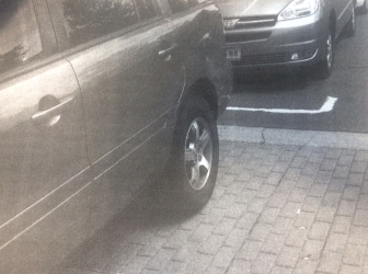 An image of the car that parked in the crosswalk. This individual filed an appeal of the $75 ticket for parking in the crosswalk. 