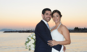 Katherine Pembrook Avgerinos, a 2002 NCHS grad, and her husband, Ivan Jose Docampo Esmoris, at the couple's July 5 wedding in Greece. Contributed