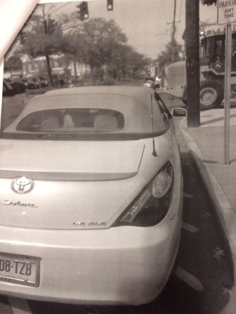 A photo of the offending motorist's car as it is parked illegally on Main Street on the afternoon of Sept. 2 while she runs into the bank. The woman appealed her ticket and during her hearing, the chairman of the Parking Commission noted that she had a nice car and asked whether it was a convertible. Photo courtesy of the New Canaan Parking Bureau