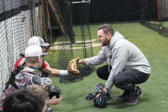 Tampa Bay Rays catcher Curt Casali gives some tips at the NC Baseball clinic, Dec. 29, 2015. Credit: Terry Dinan