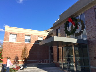 A "two-way" wreath hangs above the new, north entrance to the addition at Town Hall. On Dec. 3, 2015. Credit: Michael Dinan