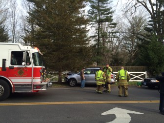 A woman suffered minor injuries following a single-car accident near 528 Main St. on the afternoon of Jan. 7, 2016. Credit: Michael Dinan