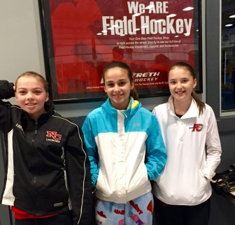 Sixth-grade field hockey players Keira Cooney, Rachel Gilio and Grace Gilman. Contributed