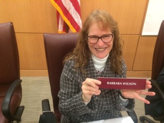 Barbara Wilson of the Inland Wetlands Commission at her last meeting on Feb. 22, 2016. She was an actively involved member for three years. The nameplate went with her. Credit: Michael Dinan