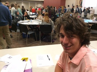 David Dayya, a NCHS senior who will participate for the final month of this academic year in the popular Senior Internship Program, at a workshop for the program in the Wagner Room at NCHS on March 15, 2016. David will intern with New Canaan nonprofit Filling In The Blanks. Credit: Michael Dinan
