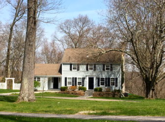 This 1937-built Colonial at 8 Hidden Meadow Lane sits on 2.27 acres. It sold April 15, 2016 for $1,015,000. Credit: Michael Dinan
