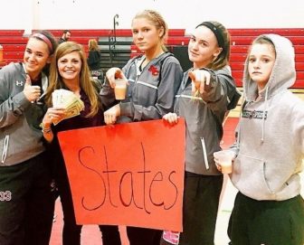 Sami (2nd from right) and Kylie (far right) with a few of their NC girls basketball teammates from their junior season in 2014-2015 when they reached the Class M state tournament. Credit: Terri Stewart
