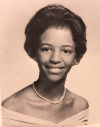 Jackie Walker's 1961 'Perannos'/NCHS yearbook senior photo. Her senior quote is "Those who bring sunshine to the lives of others cannot keep it from themselves."