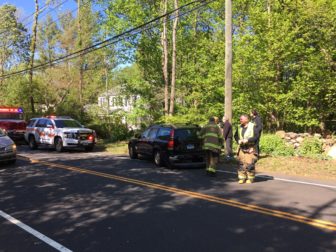 The aftermath of an accident on Old Stamford Road just south of Richard's Lane in New Canaan, on May 16, 2016. Credit: Michael Dinan
