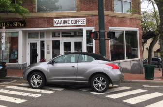 Double-letter and triple-word score for this botched parking job at Main Street and East Avenue. Credit: Michael Dinan