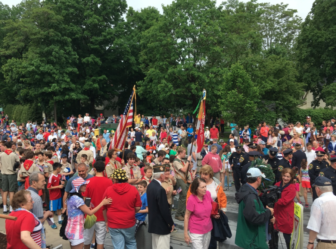 Residents gather outside the northern entrance to Town Hall following the Memorial Day Parade in New Canaan, May 30, 2016. Credit: Michael Dinan