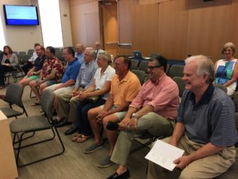 The Town Council on July 20, 2016 recognized the members of the New Canaan Family Fourth Committee during its regular meeting at Town Hall. L-R (front row): Win Goodrich, Steve Parrett, Doug Richardson, Scott Cluett, Suzanne Jonker, Steve Benko, Rob Mallozzi and Tom Stadler. Credit: Michael Dinan