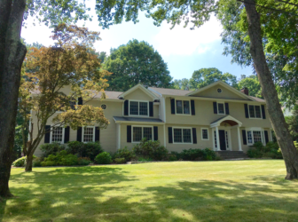 This 1964-built, 5-bedroom Colonial at 1 Meadow Lane includes 3,340 square feet of living space and sits on .62 acres. It sold July 11, 2016 for $1,725,000. Credit: Michael Dinan