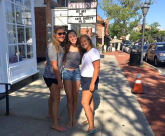 Pictured left to right: Chloe Sigg, 15, Victoria Whitcomb, 15, and Charlotte Sigg. 13, walk together after a day of fun to go for dinner.