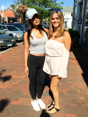 Pictured left to right: Julia Fleisher, Rollins College '19, and Tess MacKenzie, University of New Hampshire '19, style cute and comfy outfits on their stroll down Elm Street.