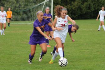 Kendall Patten dribbles by Westhill attackers after stealing the ball in a game played Sept. 29, 2016. Credit: Samantha Loomis