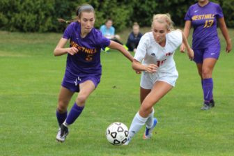 Eliza Farley dribbles the ball up the field in a game vs. Westhill on Sept. 29, 2016. Credit: Samantha Loomis
