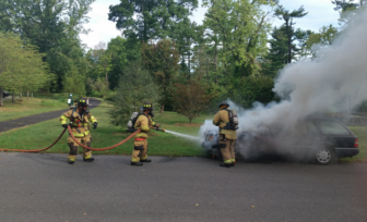 New Canaan firefighters put out a car fire at Irwin Park on Sept. 20, 2016. Published with permission from its owner 