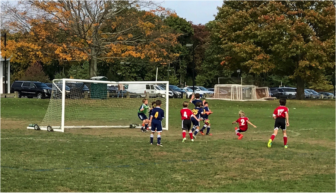 New Canaan Boys 2007 Red in Red from left to right Rogan Lowe, William Arnold and Jackson Mountford. Contributed