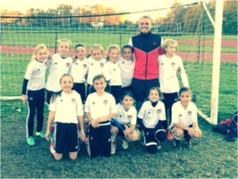 New Canaan’s U10 Girls Red Soccer Team Celebrating a Winning Season with Coach Luke Green. Contributed